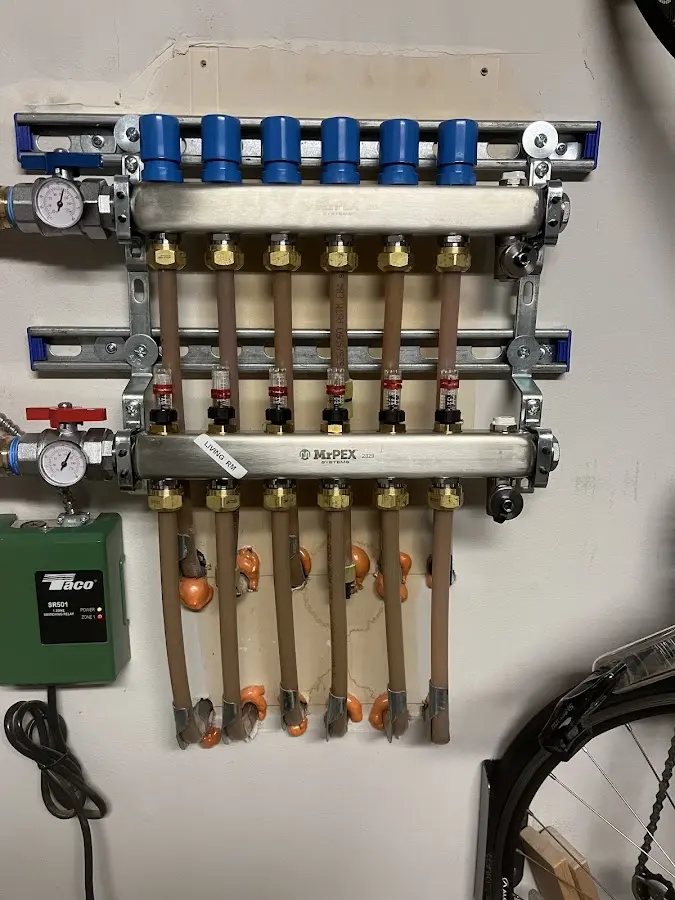 Plumber performing Water Heater Repair at a residential property in Pinetop-Lakeside